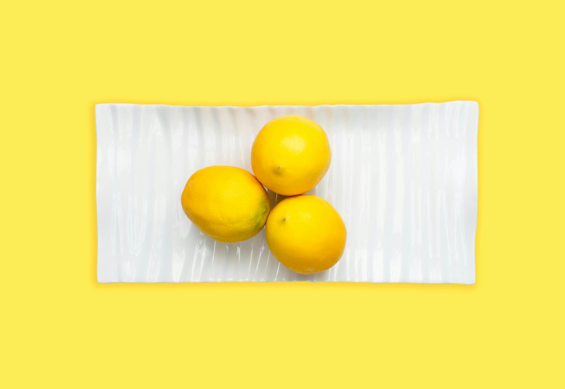 Fresh lemons arranged to symbolize the open, honest communication needed for couples navigating solo pleasure