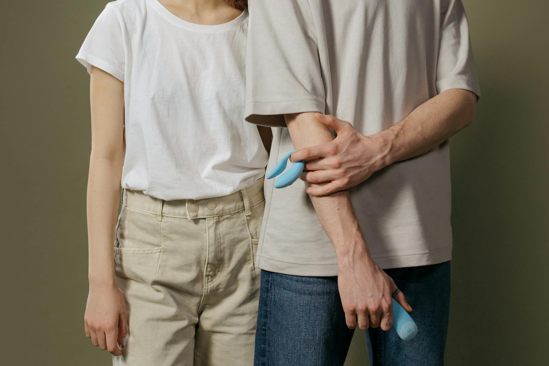 A couple exploring intimacy together with modern clitoral vibrator technology